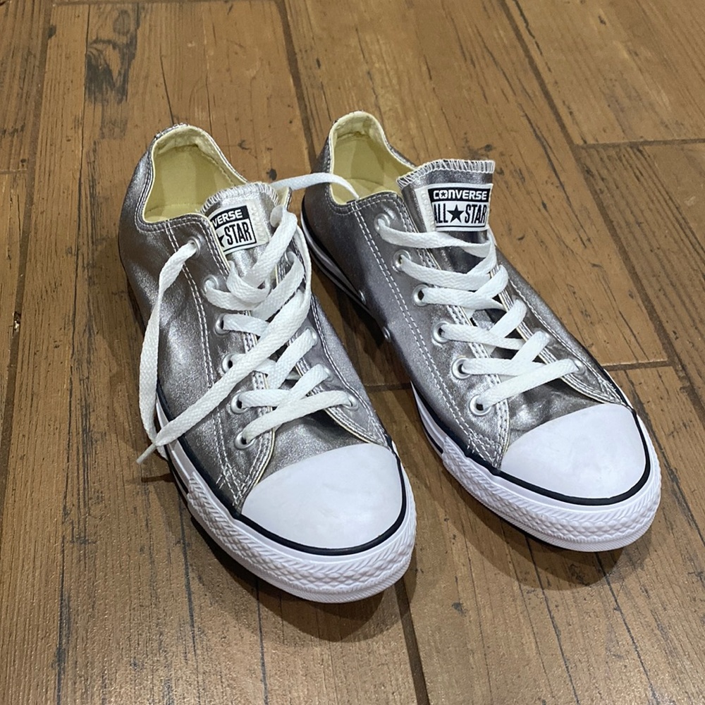 Silver All Star Converse, Women’s Size 10. Never worn.